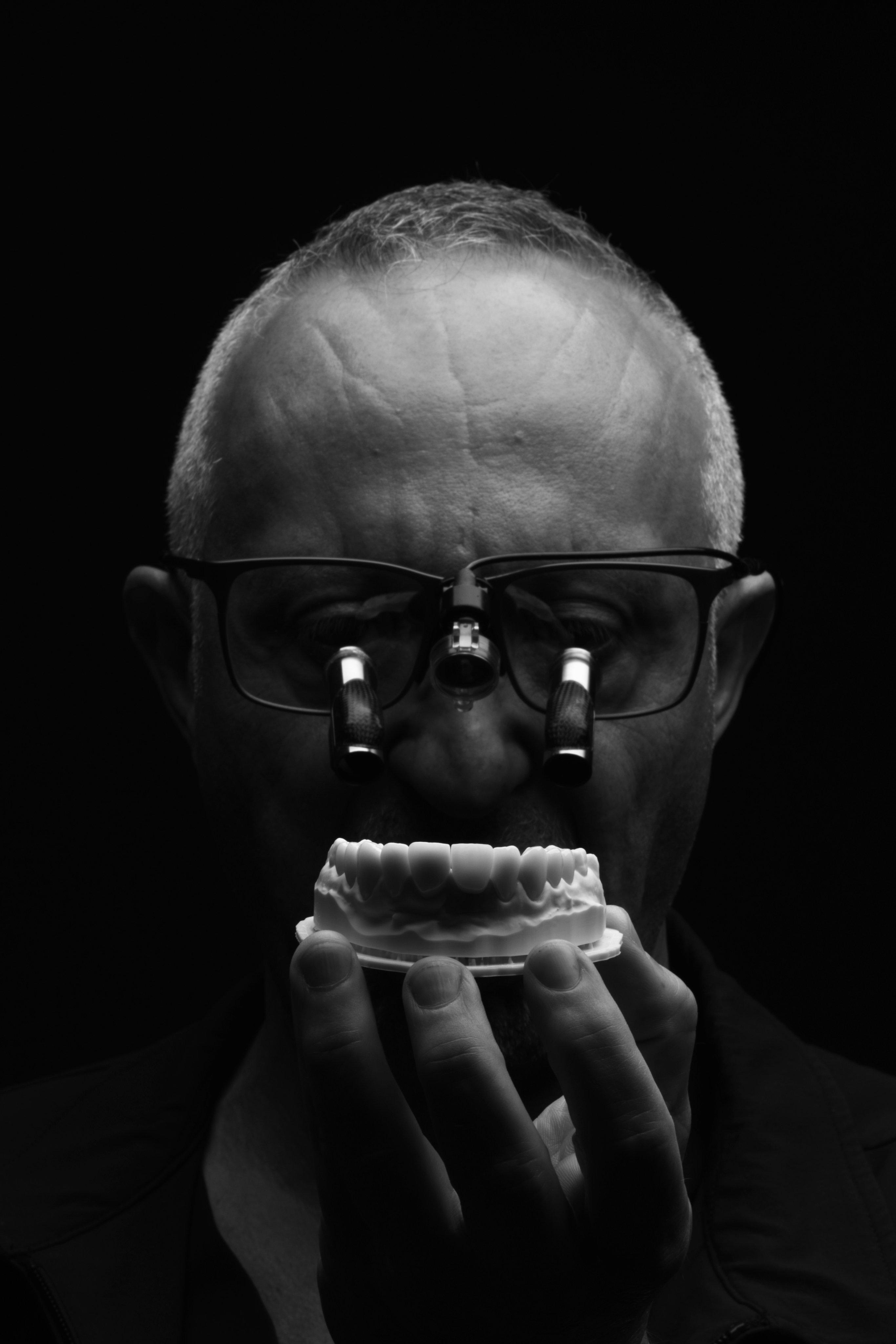 Dr. Roytberg with dental loupes